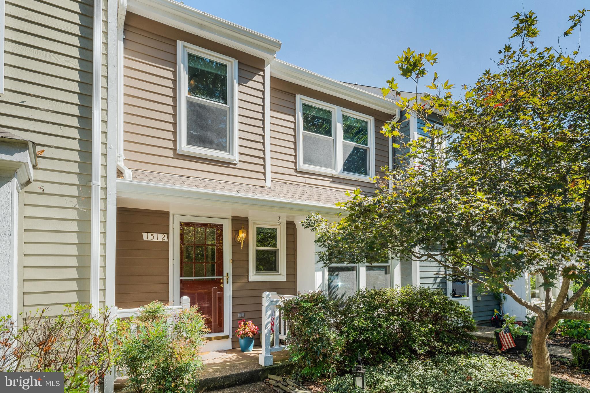 1512 Poplar Grove Drive Reston, VA 20194 - Photo 1 of 70 a view of a house with a tree
