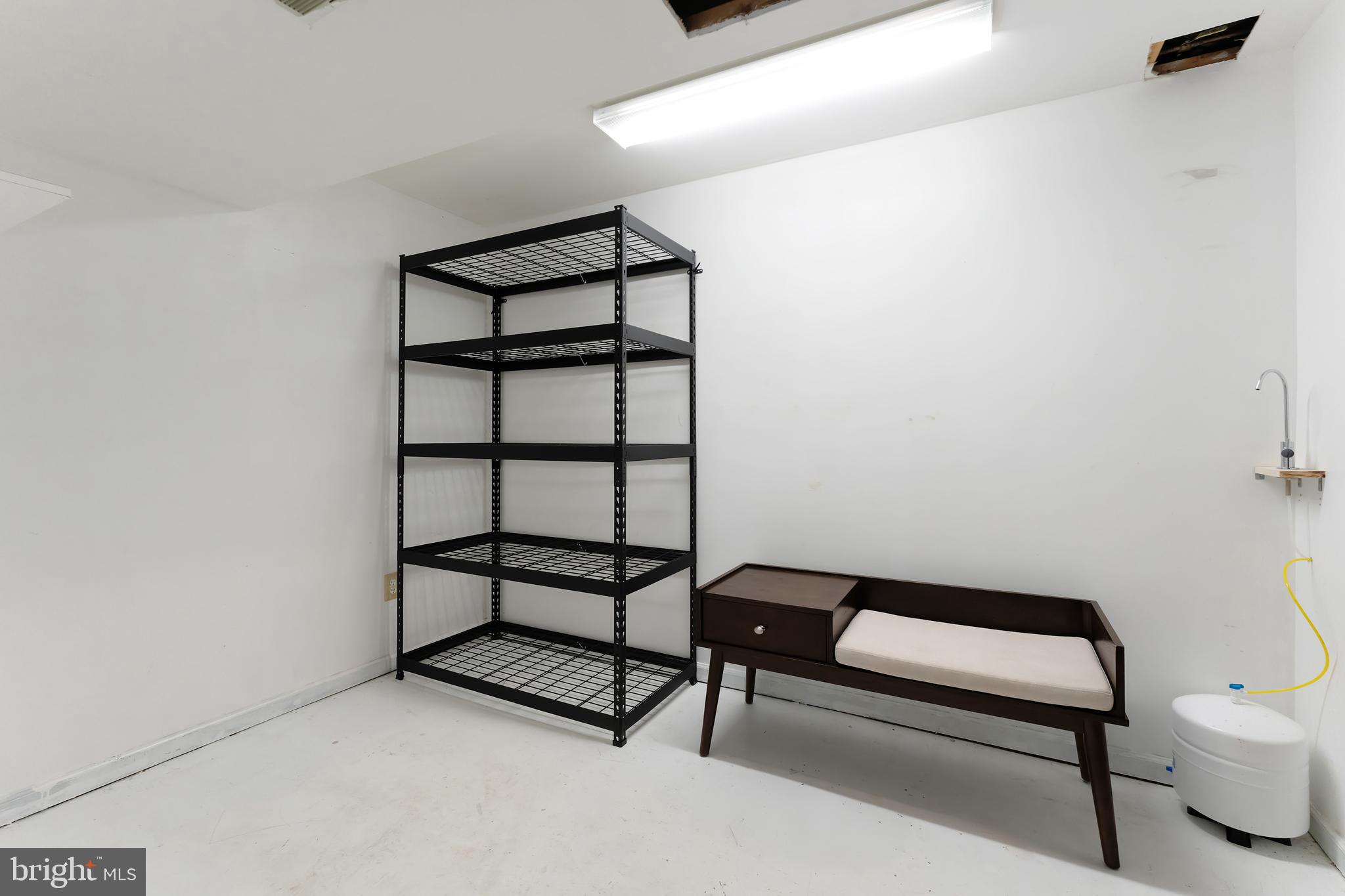 1512 Poplar Grove Drive Reston, VA 20194 - Photo 30 of 70 a view of a room with racks on the wall