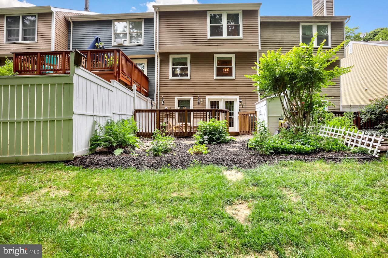 1512 Poplar Grove Drive Reston, VA 20194 - Photo 32 of 70 a front view of a house with a garden