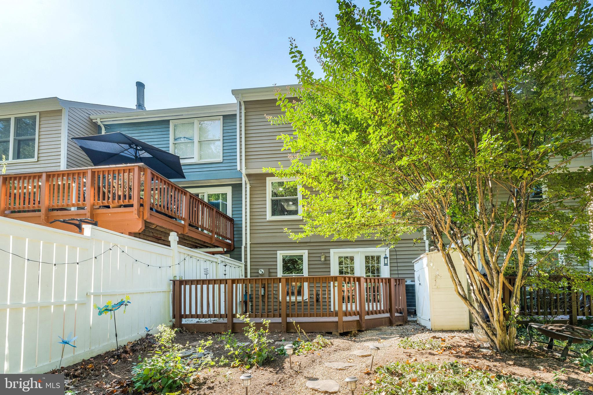 1512 Poplar Grove Drive Reston, VA 20194 - Photo 34 of 70 a front view of a house with a garden