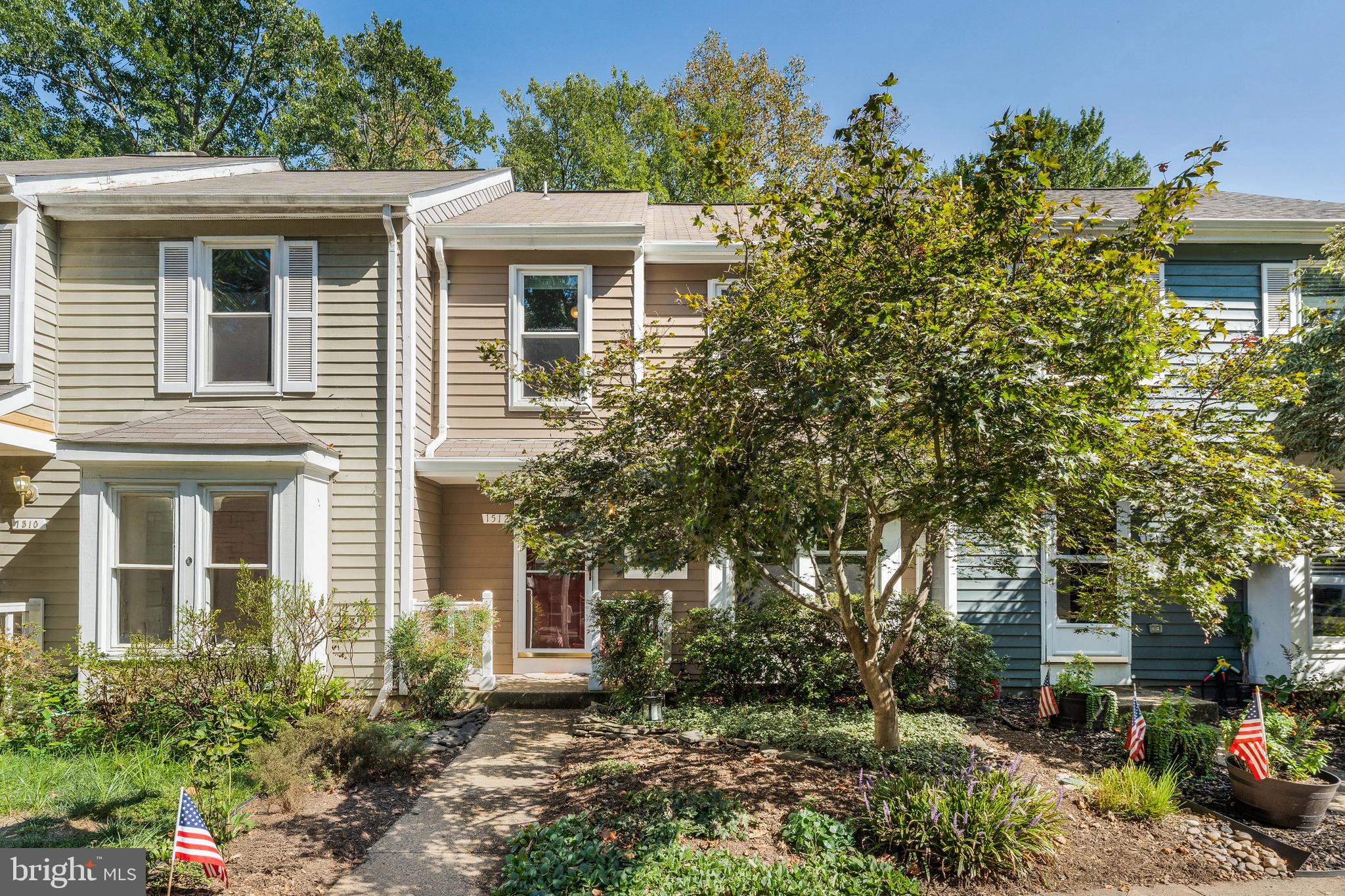 1512 Poplar Grove Drive Reston, VA 20194 - Photo 37 of 70 front view of a house with a yard