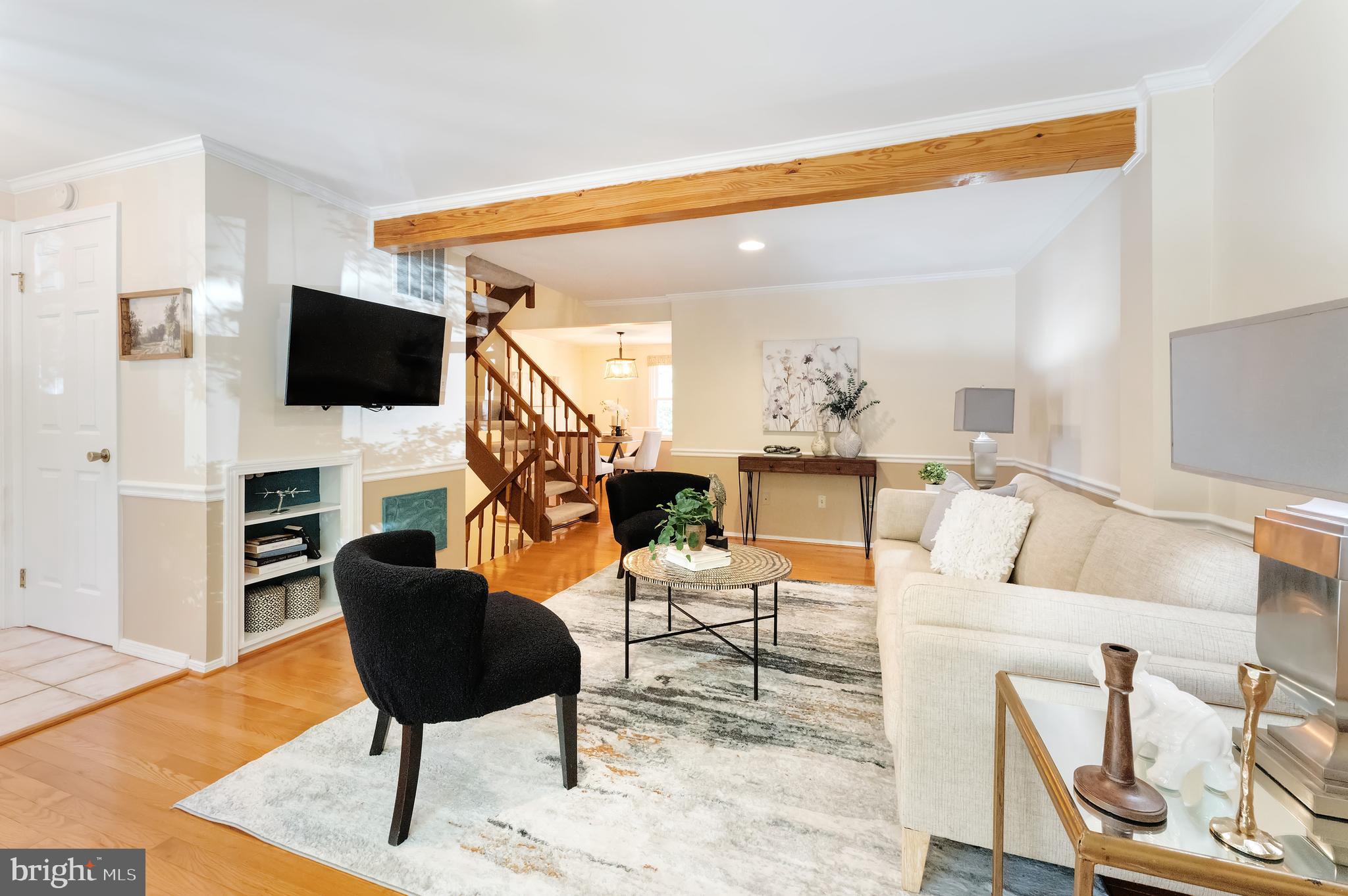 1512 Poplar Grove Drive Reston, VA 20194 - Photo 4 of 70 a living room with furniture and a flat screen tv