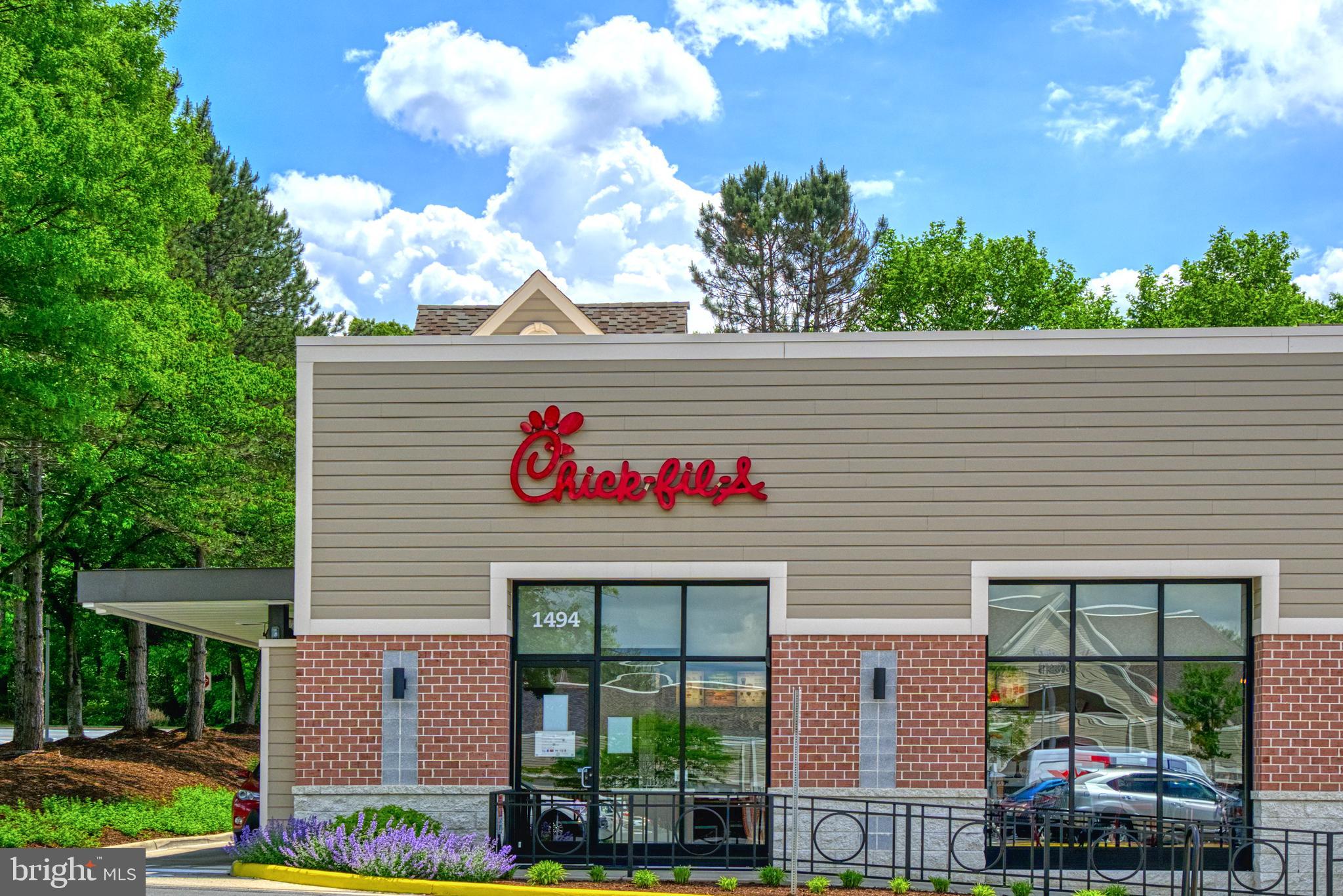 1512 Poplar Grove Drive Reston, VA 20194 - Photo 51 of 70 a sign that is on the side of a brick building