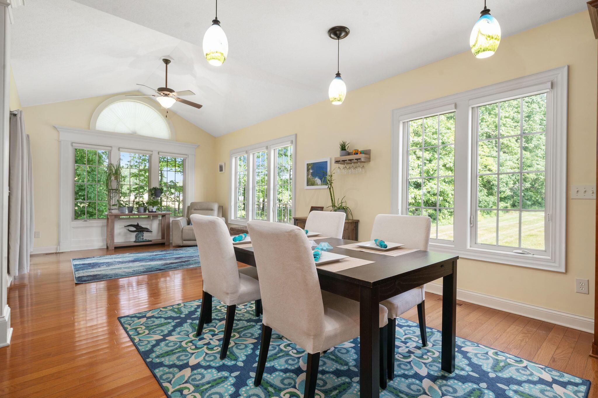 5398 Slater Ridge Westerville, OH 43082 - Photo 4 of 49 Dining space in kitchen opens to sunroom