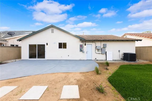a house view with a garden space