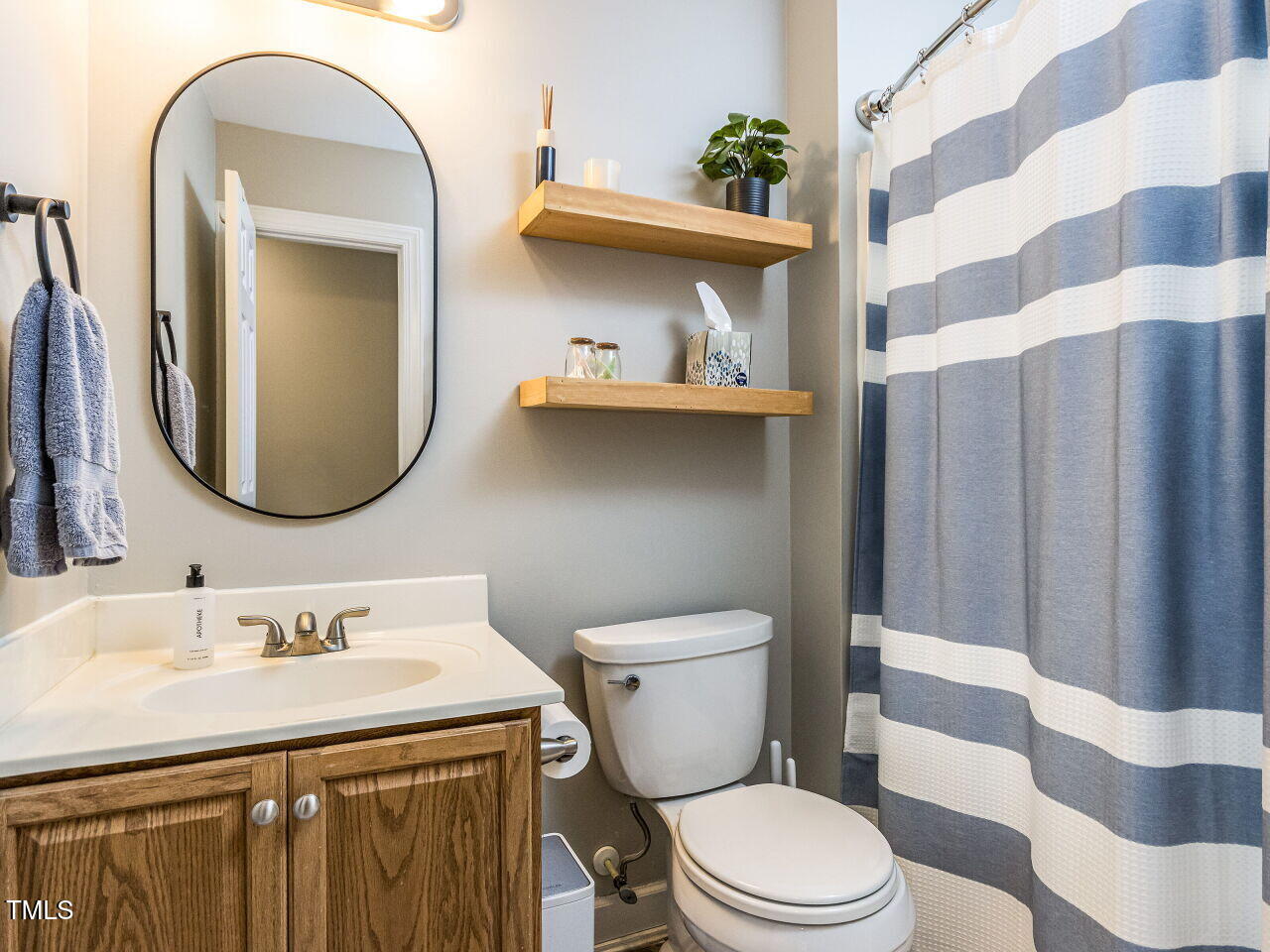 2019 Falls River Avenue Raleigh, NC 27614 - Photo 27 of 40 Hall Bath with floating shelves.
