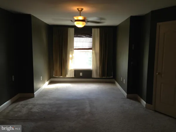 a view of empty room with a window