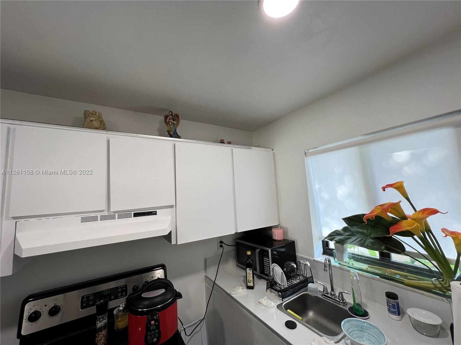 Kendale Lakes Miami, FL 33183 - Photo 11 of 26 a room with storage and utility