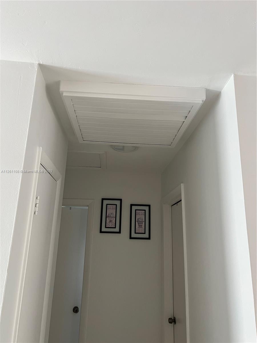 Kendale Lakes Miami, FL 33183 - Photo 19 of 26 a view of a hallway with a elevator