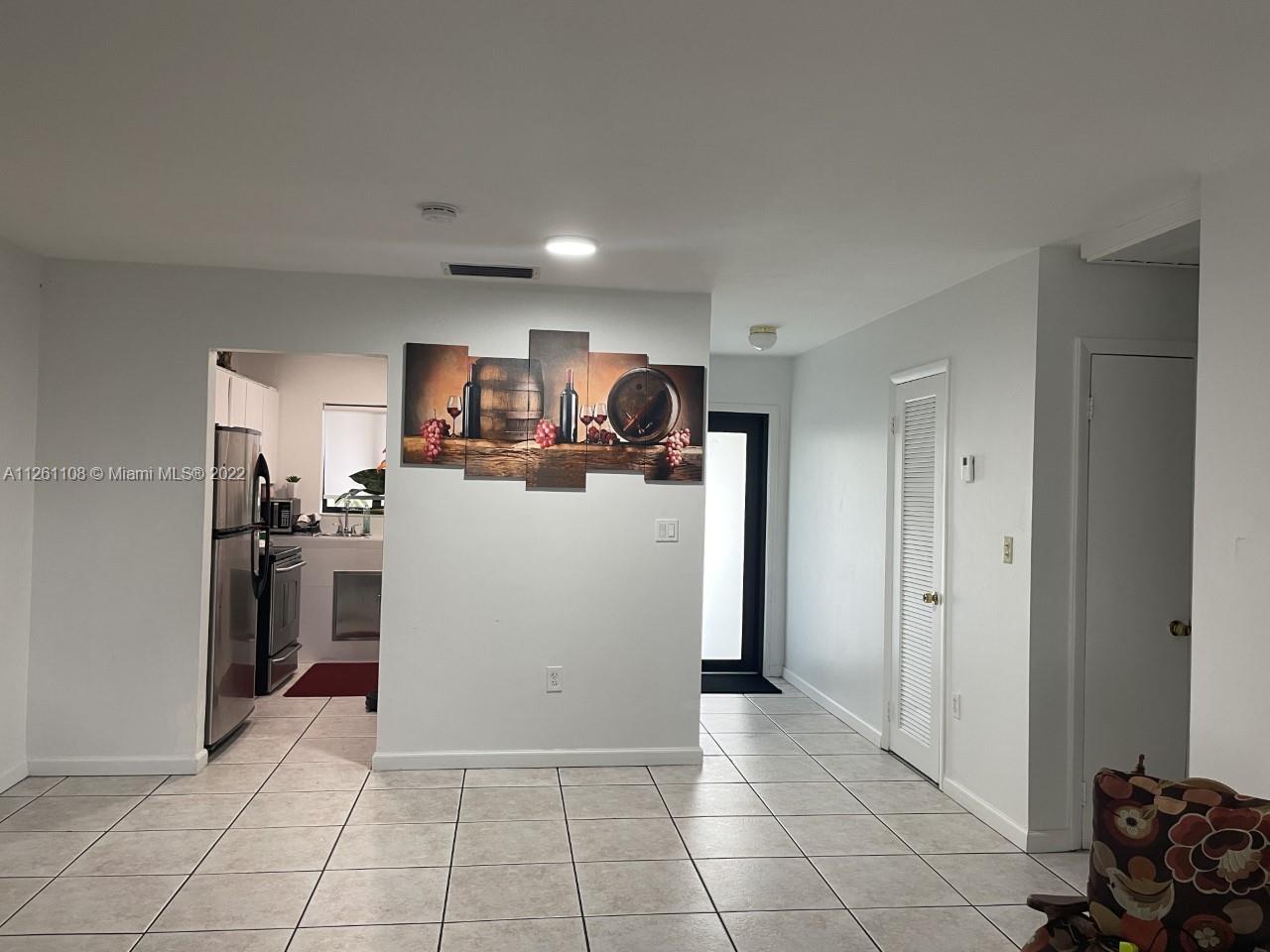 Kendale Lakes Miami, FL 33183 - Photo 7 of 26 a view of a storage & utility room with two washing machine