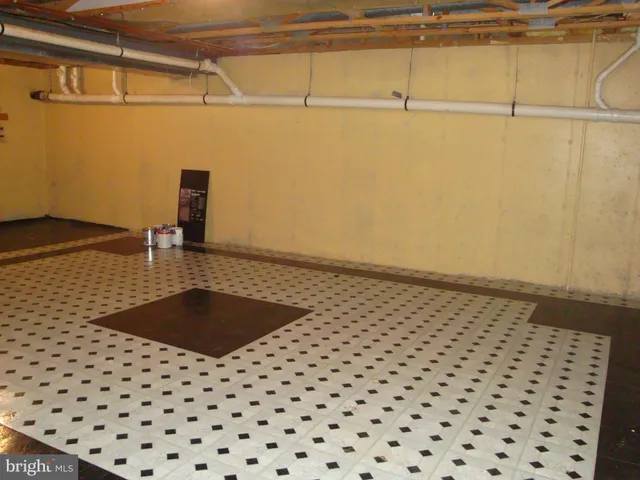 a view of a grassy field with trees