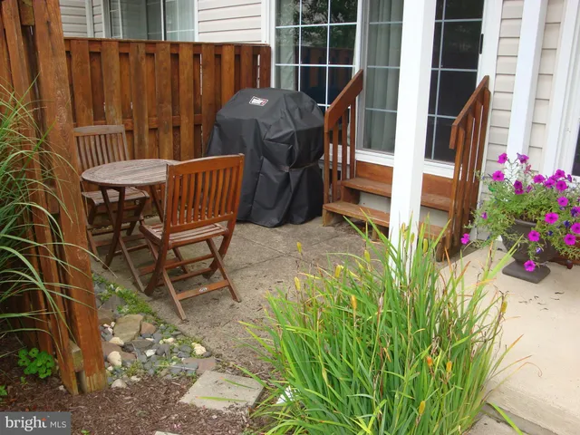 a view of a chairs in kitchen and bathroom