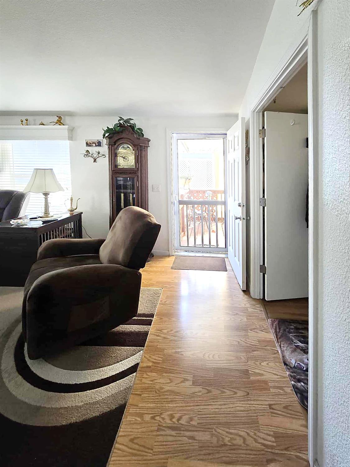 18717 Mill Villa Road, Unit 615 Jamestown, CA 95327 - Photo 11 of 19 a living room with furniture and a window