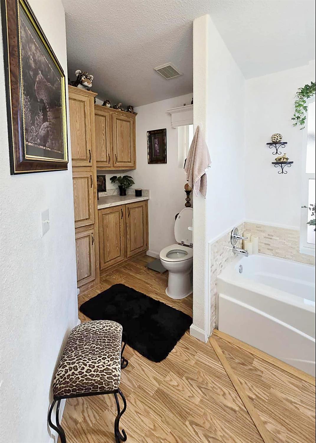 18717 Mill Villa Road, Unit 615 Jamestown, CA 95327 - Photo 14 of 19 a spacious bathroom with a tub shower and sink