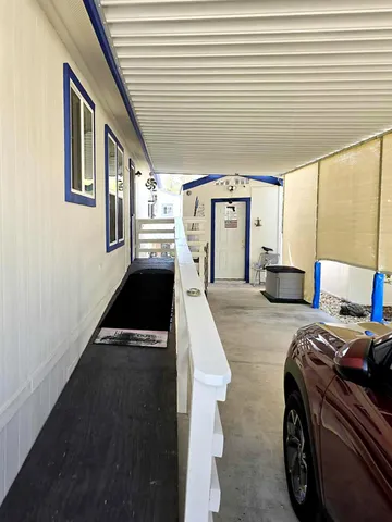 a bed room with two beds and a window