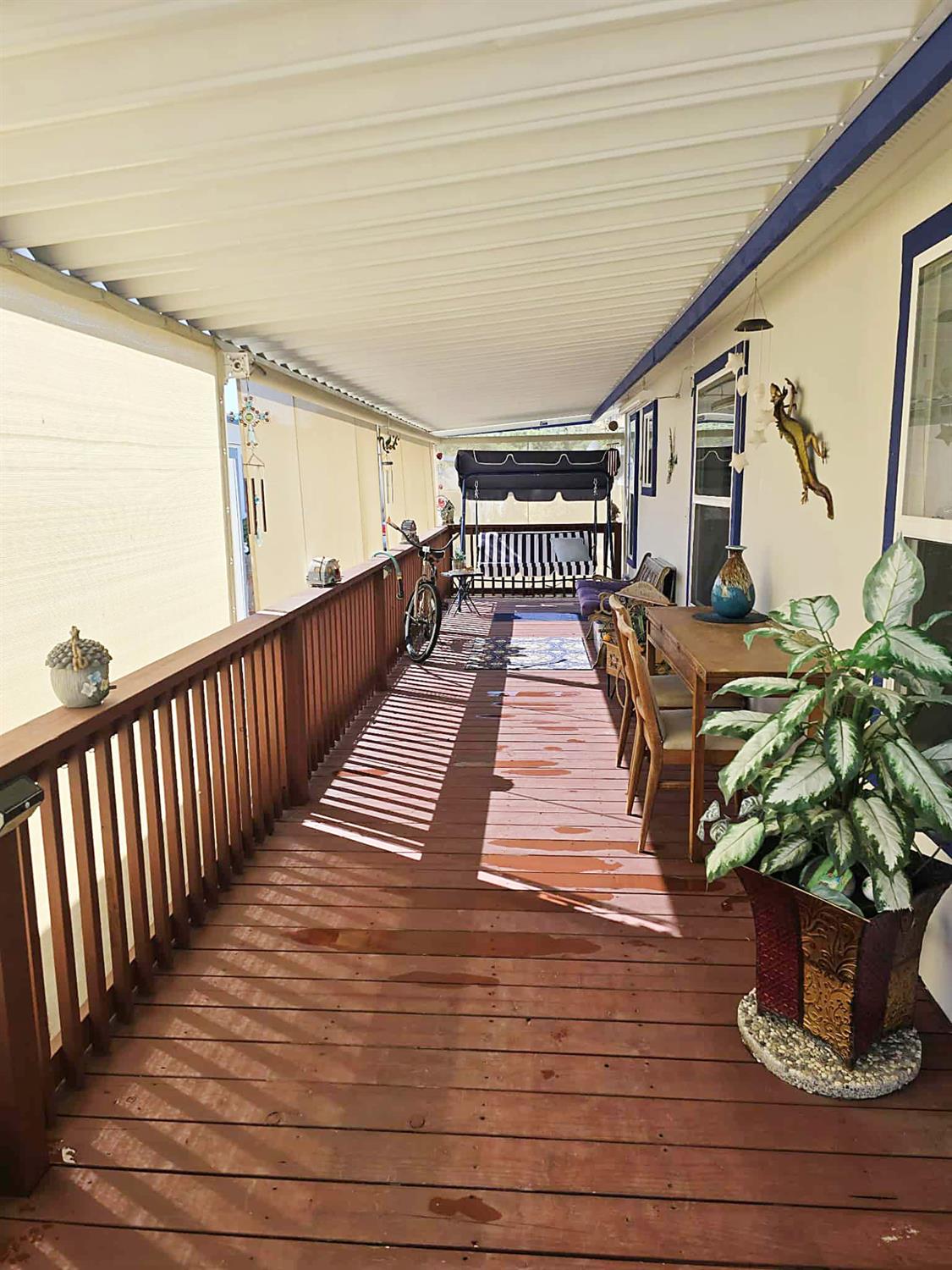 18717 Mill Villa Road, Unit 615 Jamestown, CA 95327 - Photo 4 of 19 a view of balcony with wooden floor