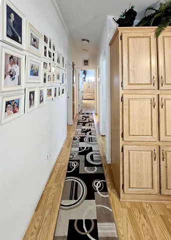 a kitchen with granite countertop a stove and a refrigerator