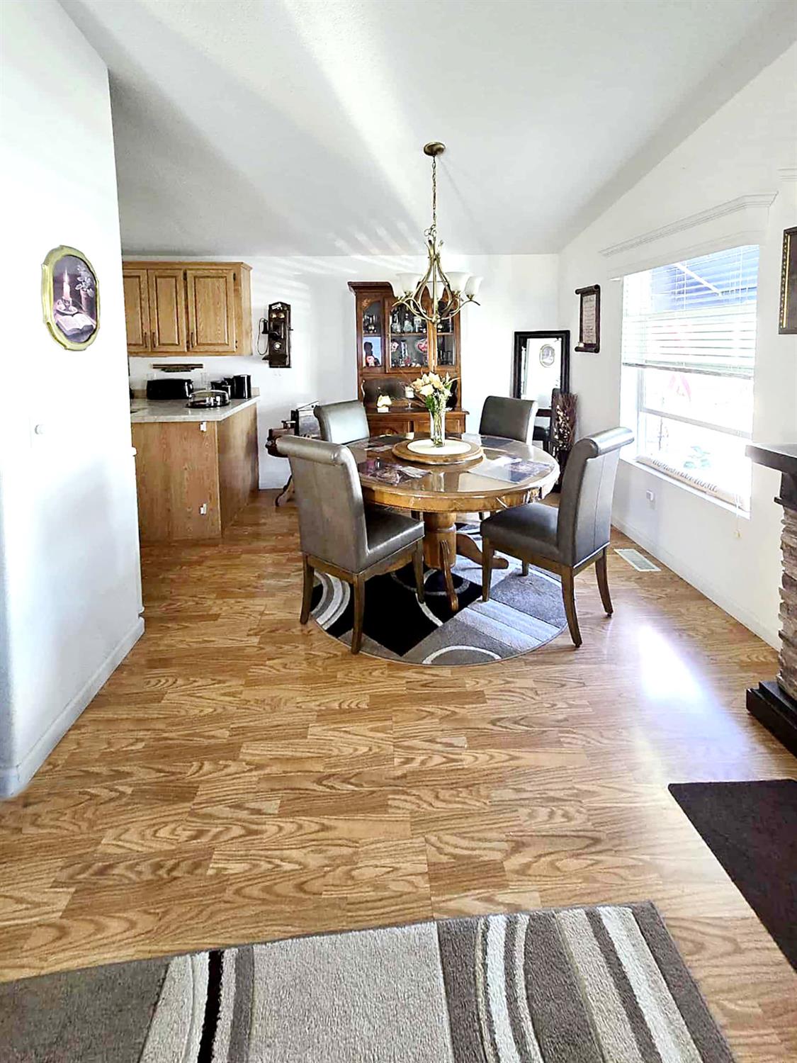 18717 Mill Villa Road, Unit 615 Jamestown, CA 95327 - Photo 10 of 19 a living room with dining room and kitchen view