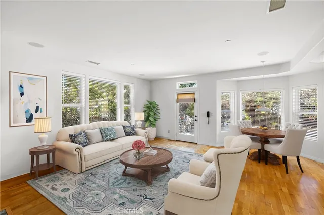 a view of a chairs and table in backyard