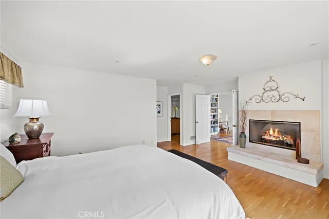 a bathroom with double sink and a mirror