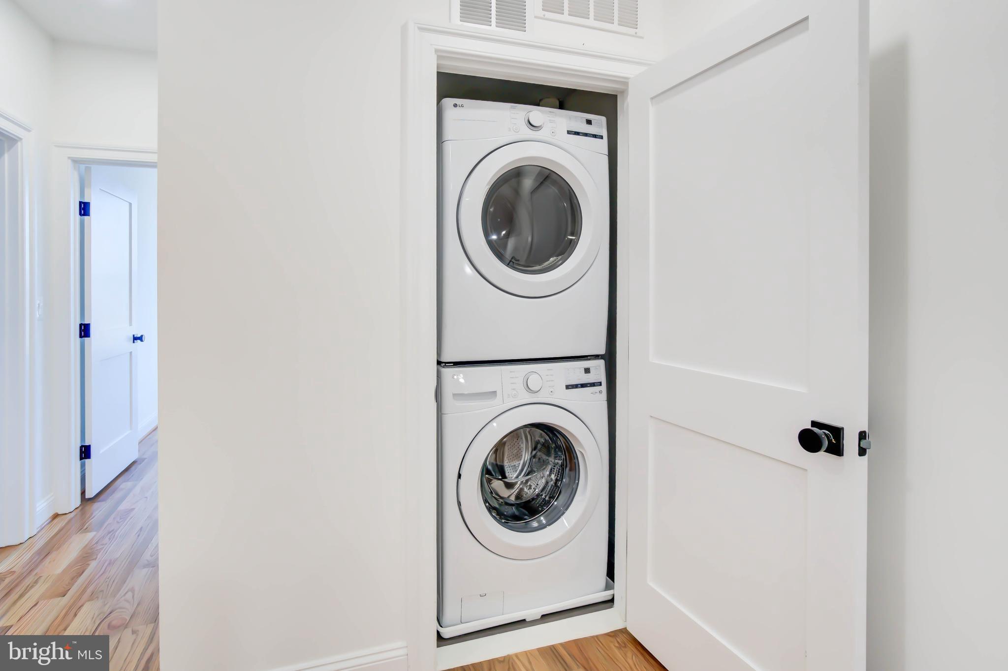 2910 18th Street Northwest Washington, DC 20009 - Photo 34 of 54 a utility room with dryer and washer