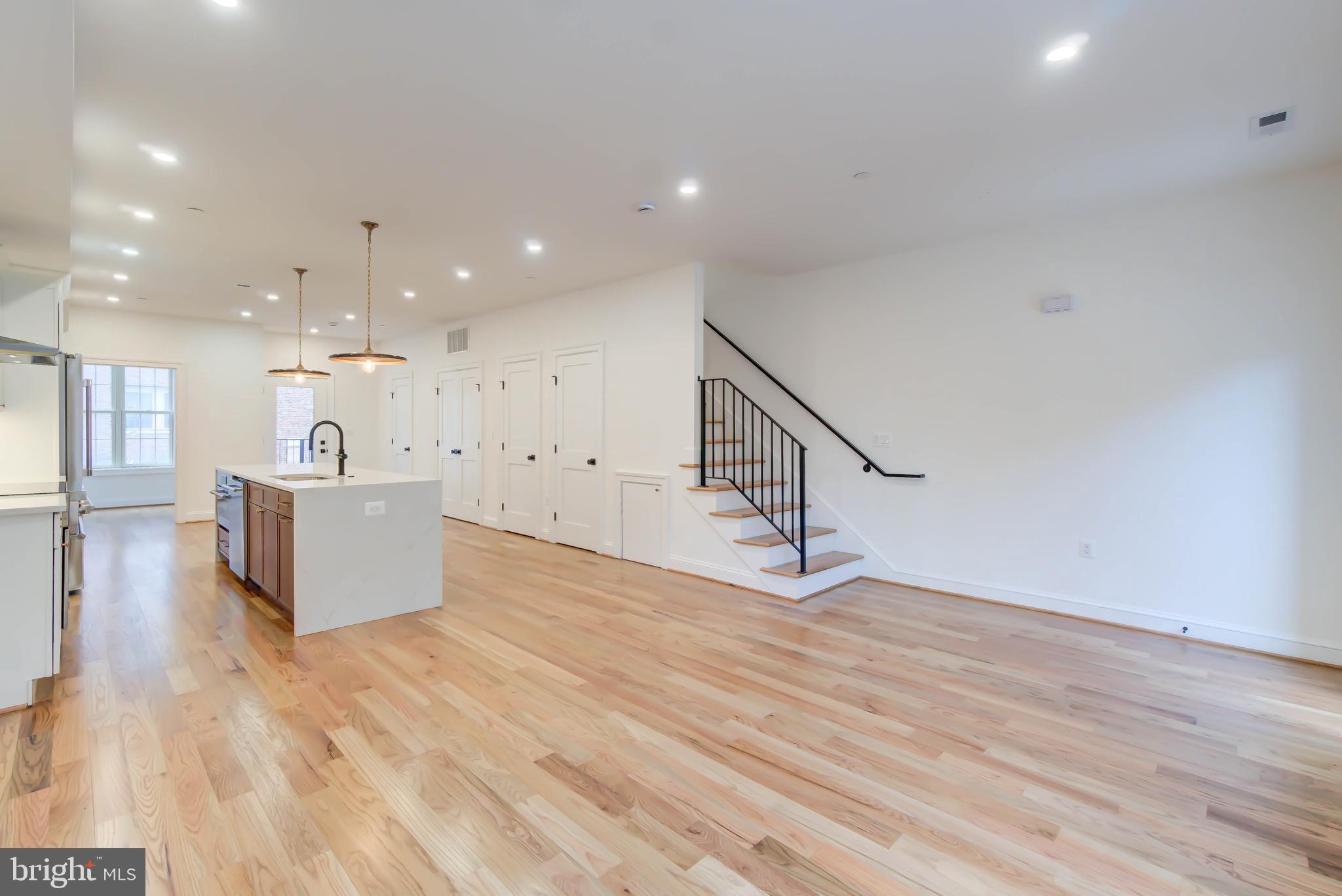 2910 18th Street Northwest Washington, DC 20009 - Photo 7 of 54 a view of a kitchen with a sink and a large window