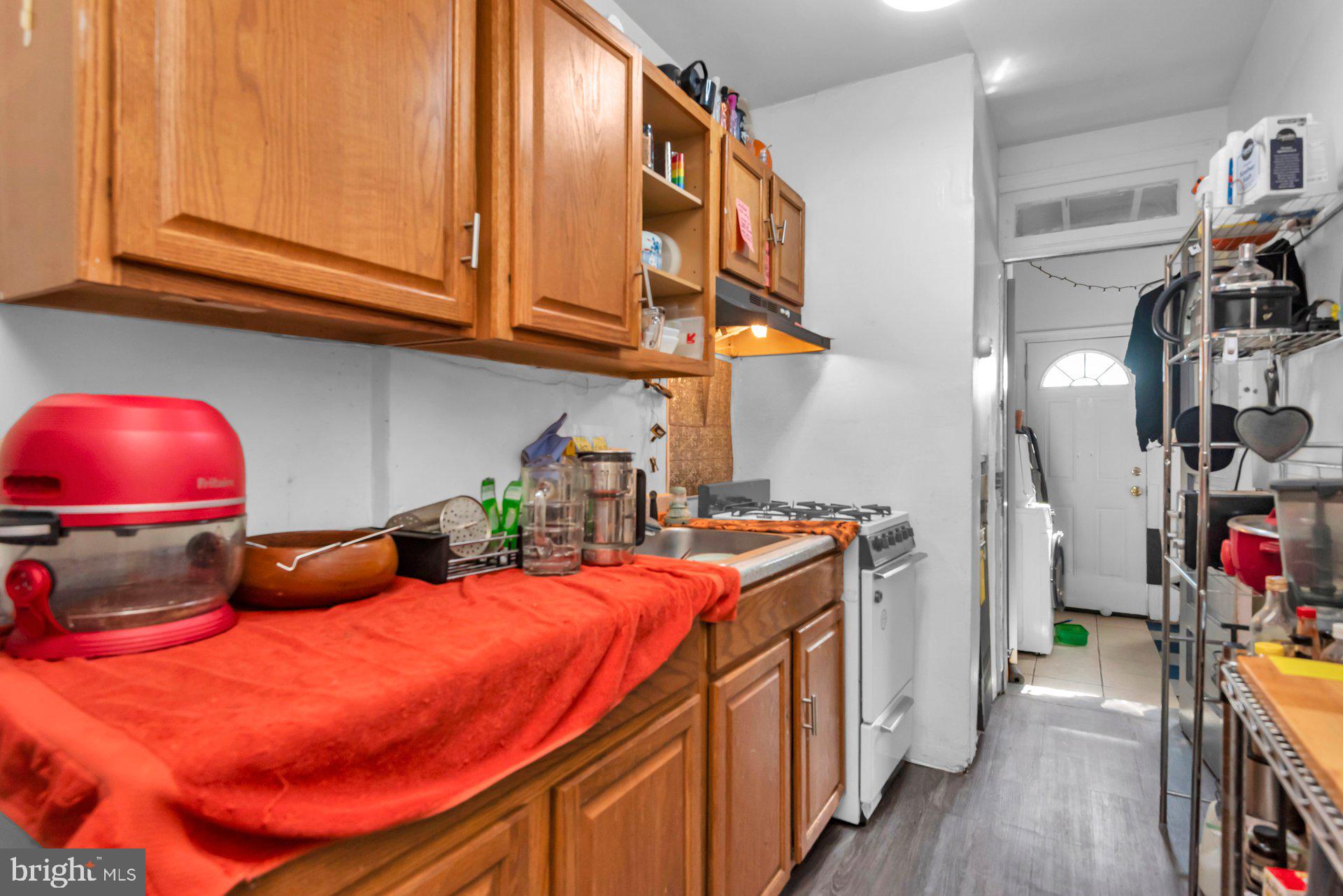 1016 Irving Street Northwest Washington, DC 20010 - Photo 28 of 37 a bedroom with furniture and a closet