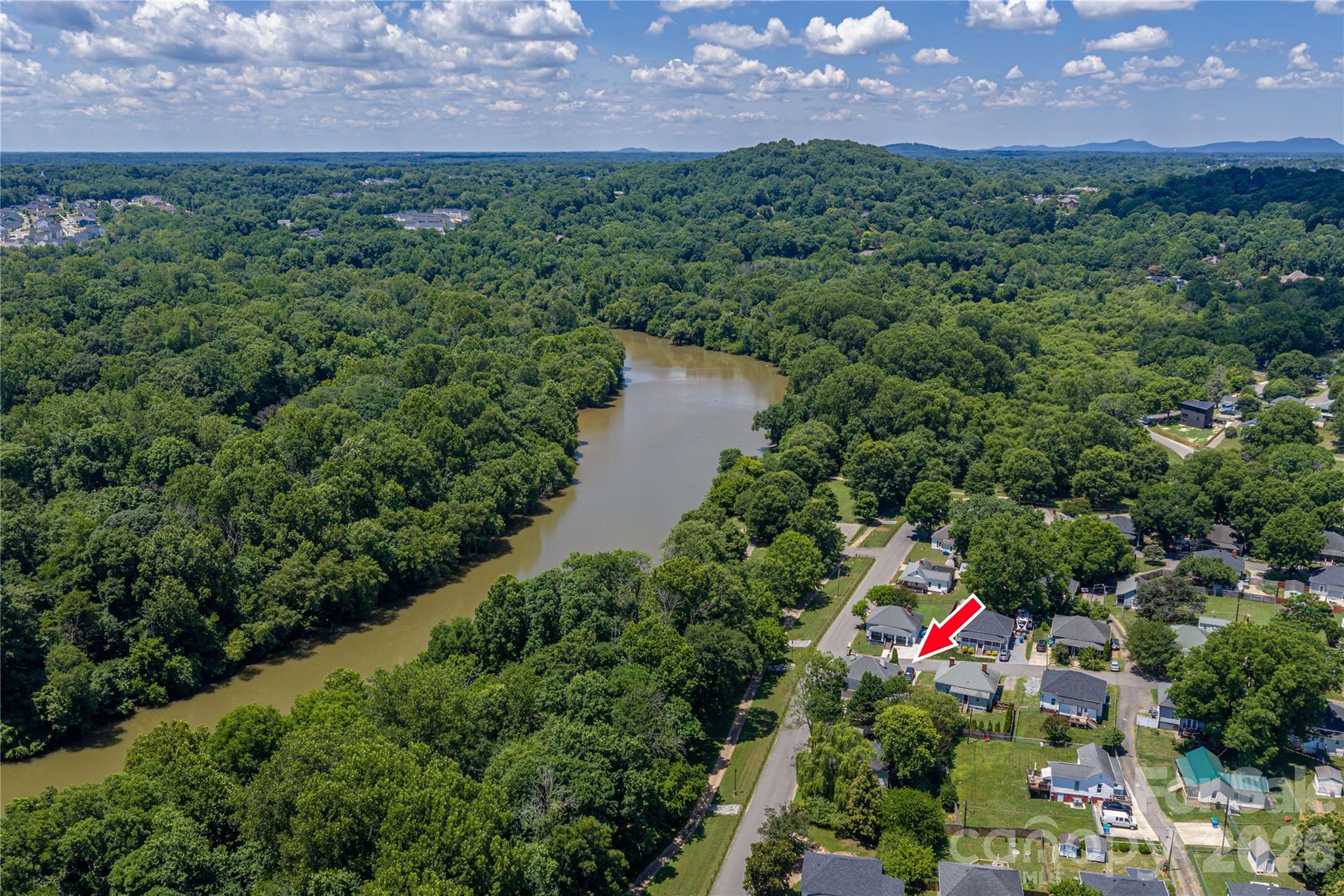 58 Fourth Street Cramerton, NC 28032 - Photo 14 of 44 a view of a lake and a mountain