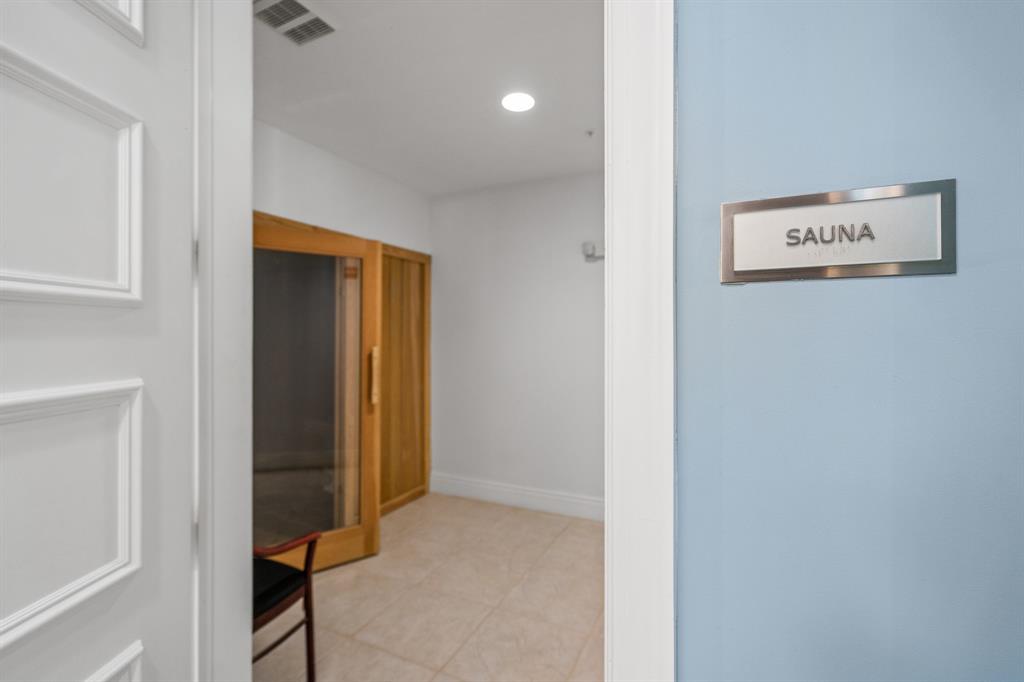 701 Southeast 21st Avenue, Unit 103 Deerfield Beach, FL 33441 - Photo 23 of 31 a view of a hallway with entryway