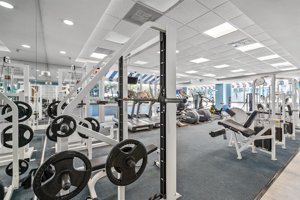 701 Southeast 21st Avenue, Unit 103 Deerfield Beach, FL 33441 - Photo 25 of 31 a view of a room with gym equipment