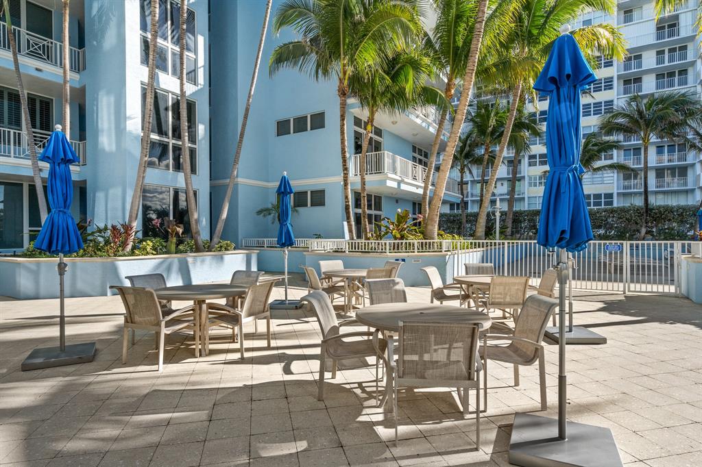 701 Southeast 21st Avenue, Unit 103 Deerfield Beach, FL 33441 - Photo 26 of 31 a view of an outdoor space with seating