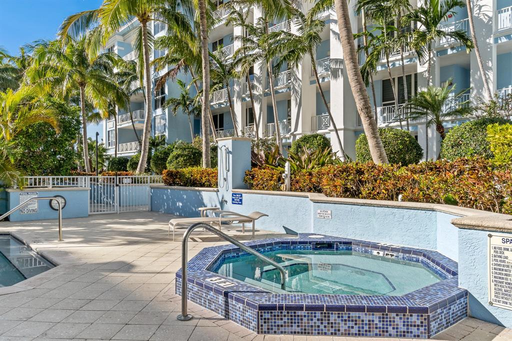 701 Southeast 21st Avenue, Unit 103 Deerfield Beach, FL 33441 - Photo 27 of 31 a view of swimming pool with outdoor seating
