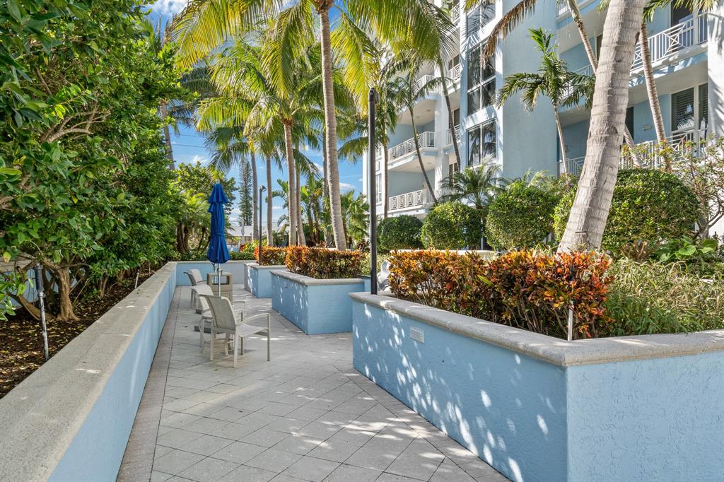 701 Southeast 21st Avenue, Unit 103 Deerfield Beach, FL 33441 - Photo 29 of 31 a view of outdoor space yard and patio