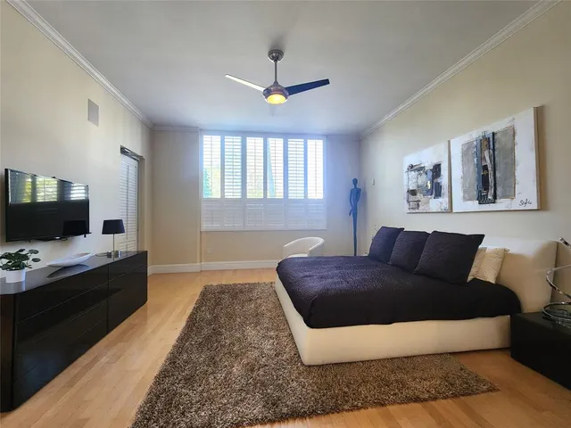 a living room with a couch and a flat screen tv