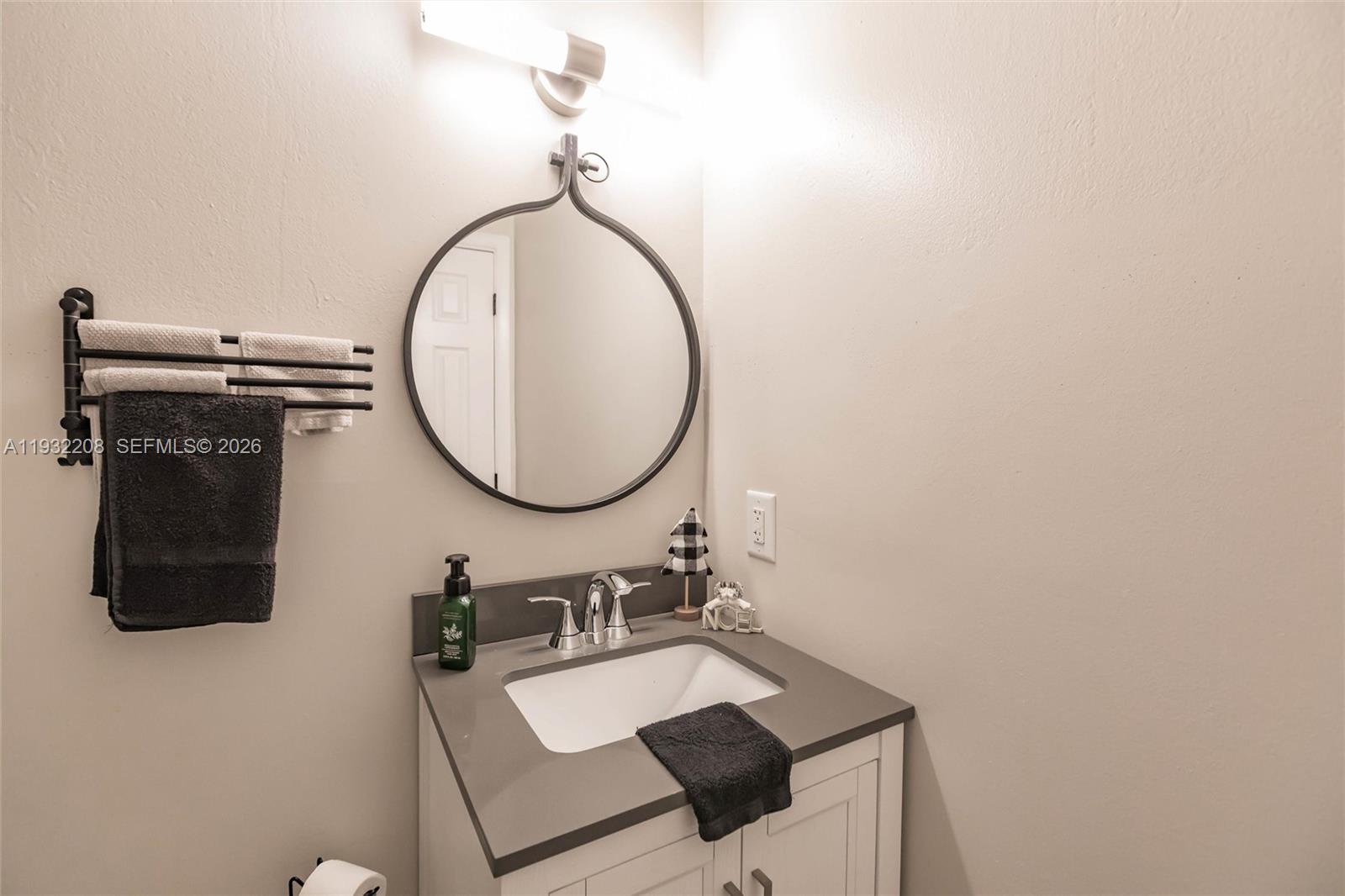 9404 Southwest 8th Terrace Miami, FL 33174 - Photo 25 of 41 a bathroom with a sink and a mirror