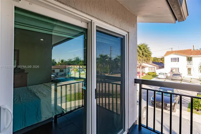a view of a balcony with a porch