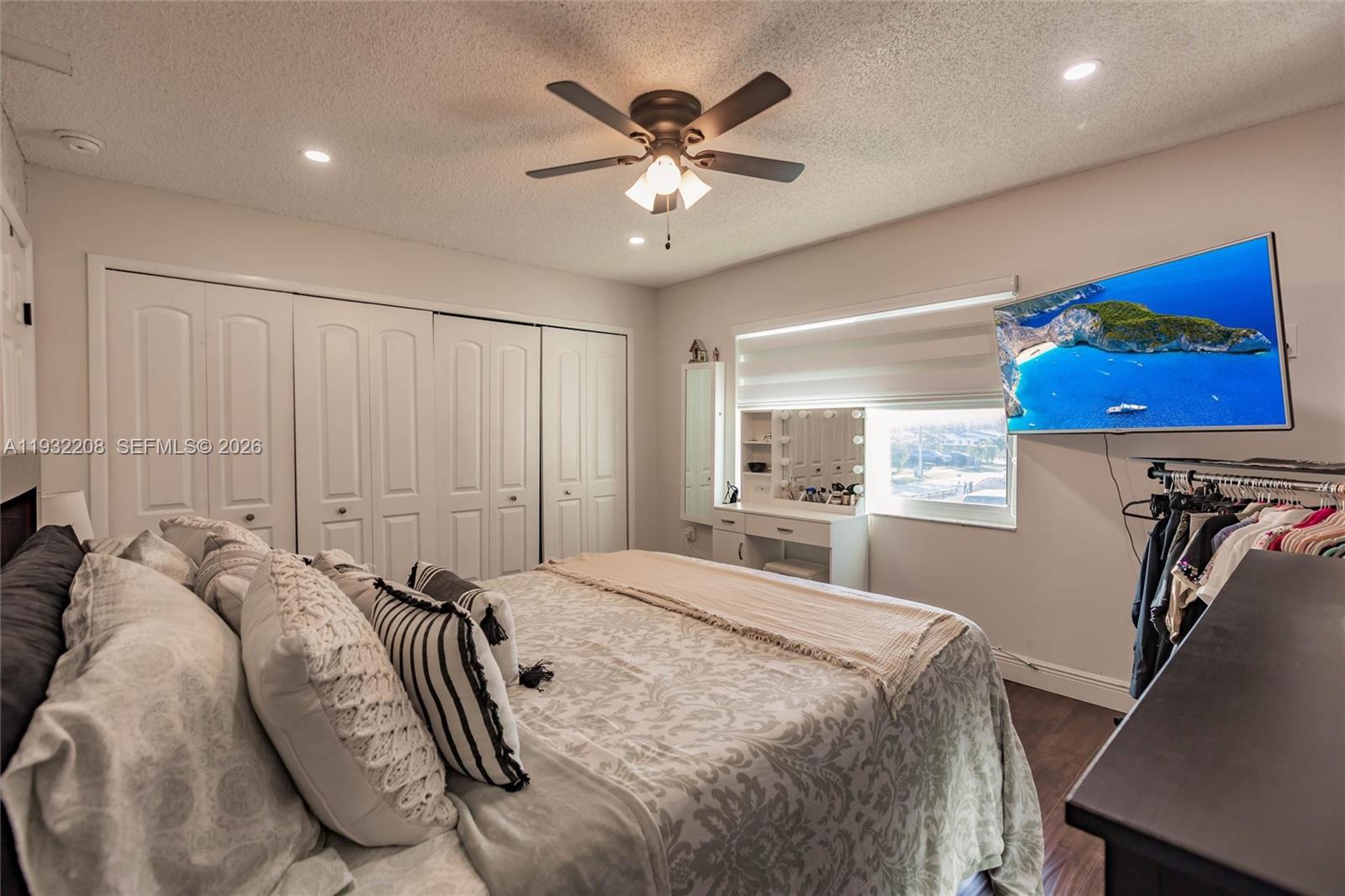 9404 Southwest 8th Terrace Miami, FL 33174 - Photo 39 of 41 a bed room with a bed and a ceiling fan