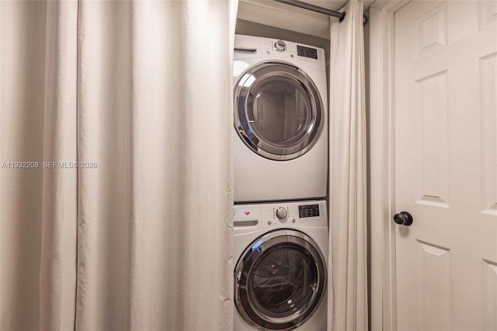 9404 Southwest 8th Terrace Miami, FL 33174 - Photo 41 of 41 a view of a hallway with washer and dryer