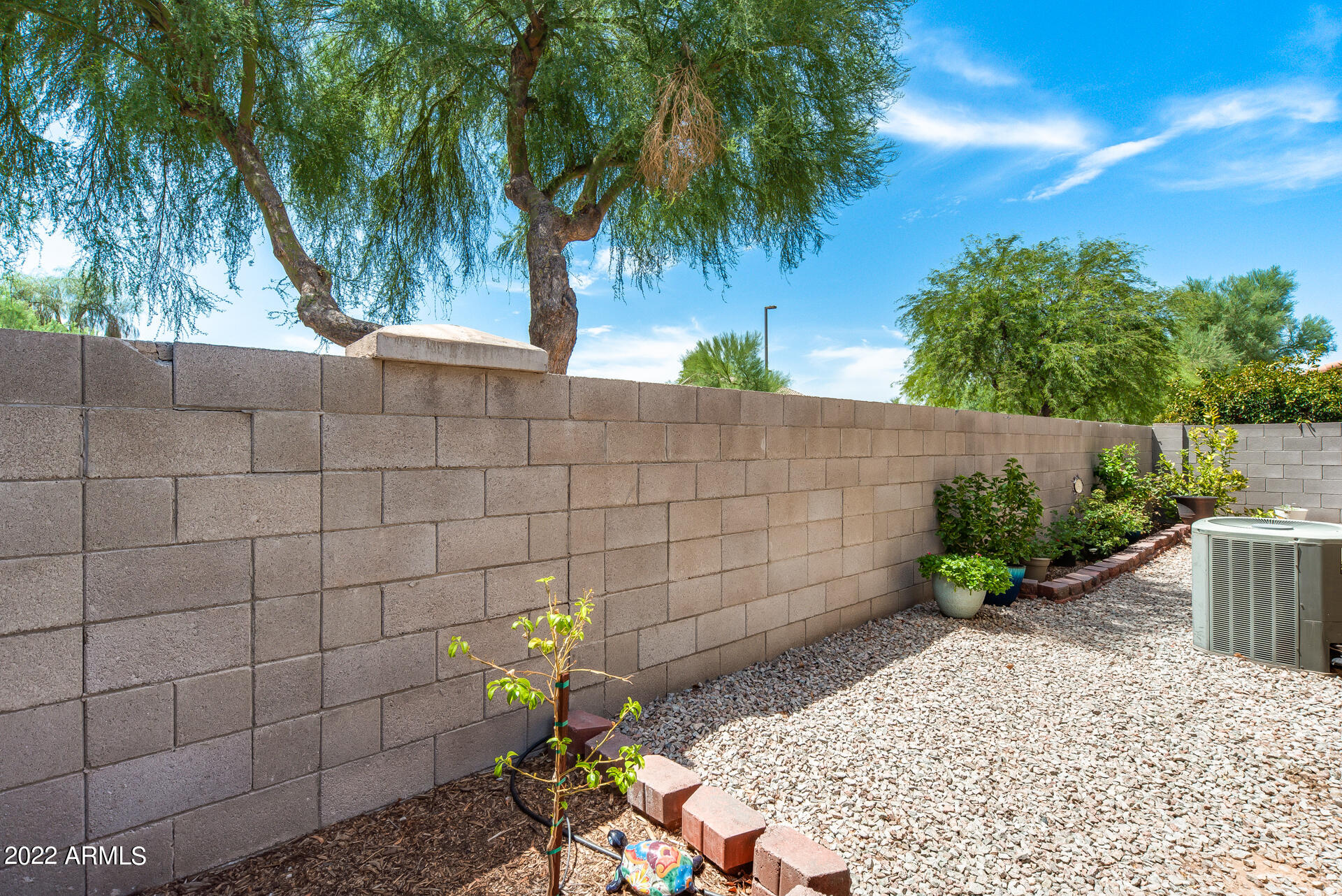 1868 South Rome Street Gilbert, AZ 85295 - Photo 30 of 34 a backyard of a house with lots of green space