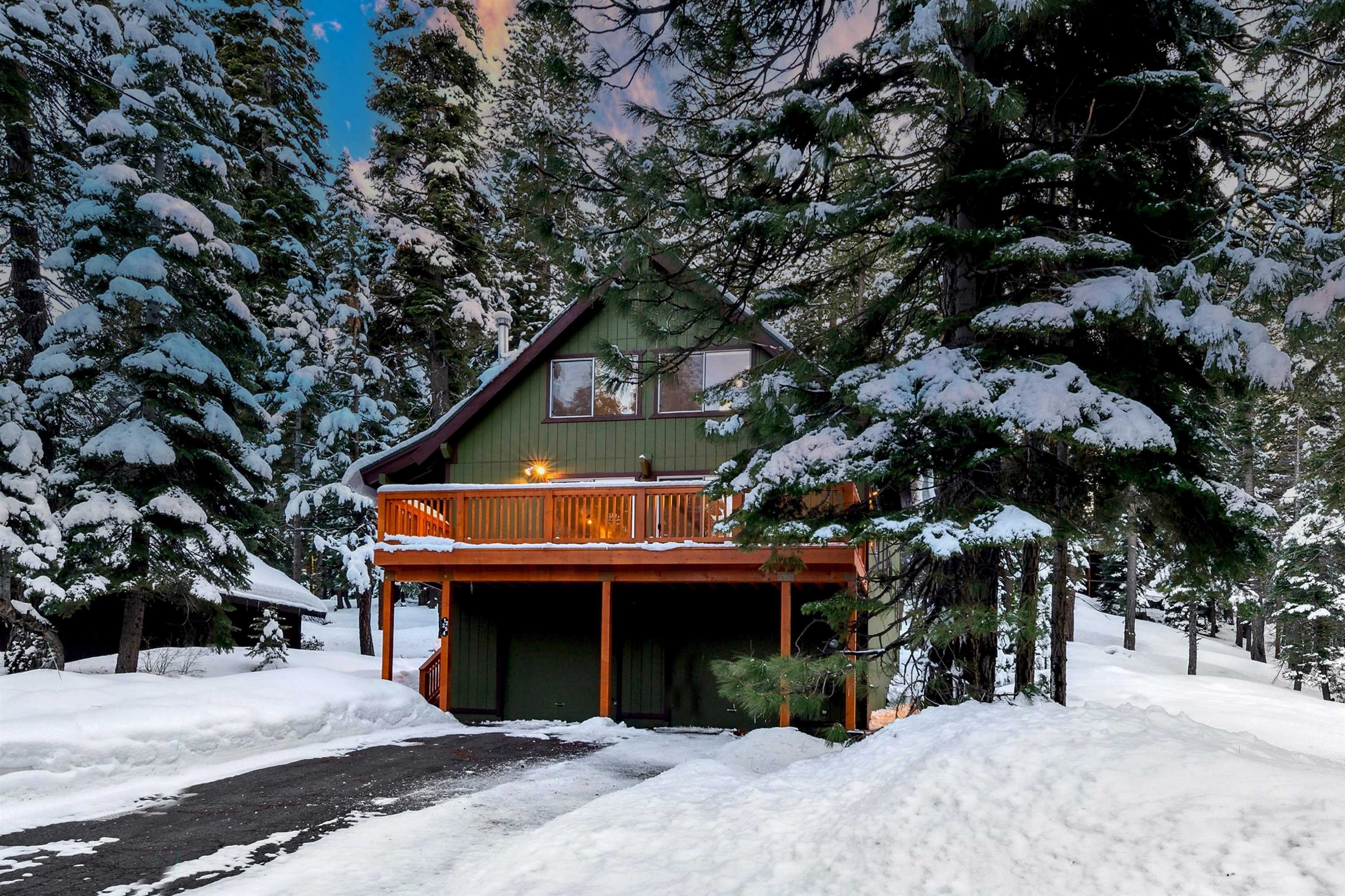 12354 Rainbow Drive Truckee, CA 96161 - Photo 1 of 23 a front view of a house with a tree