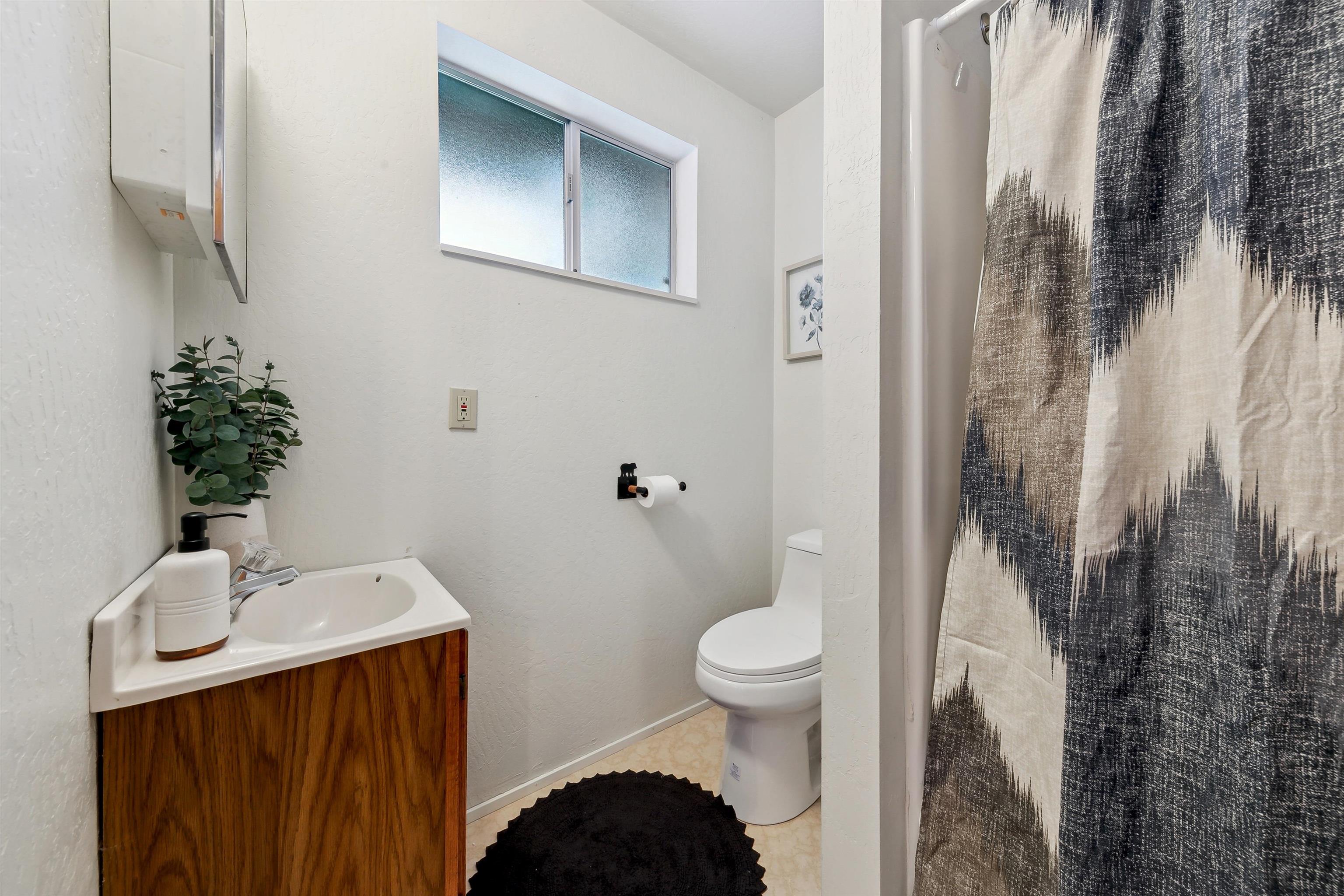 12354 Rainbow Drive Truckee, CA 96161 - Photo 16 of 23 a bathroom with a sink toilet and shower