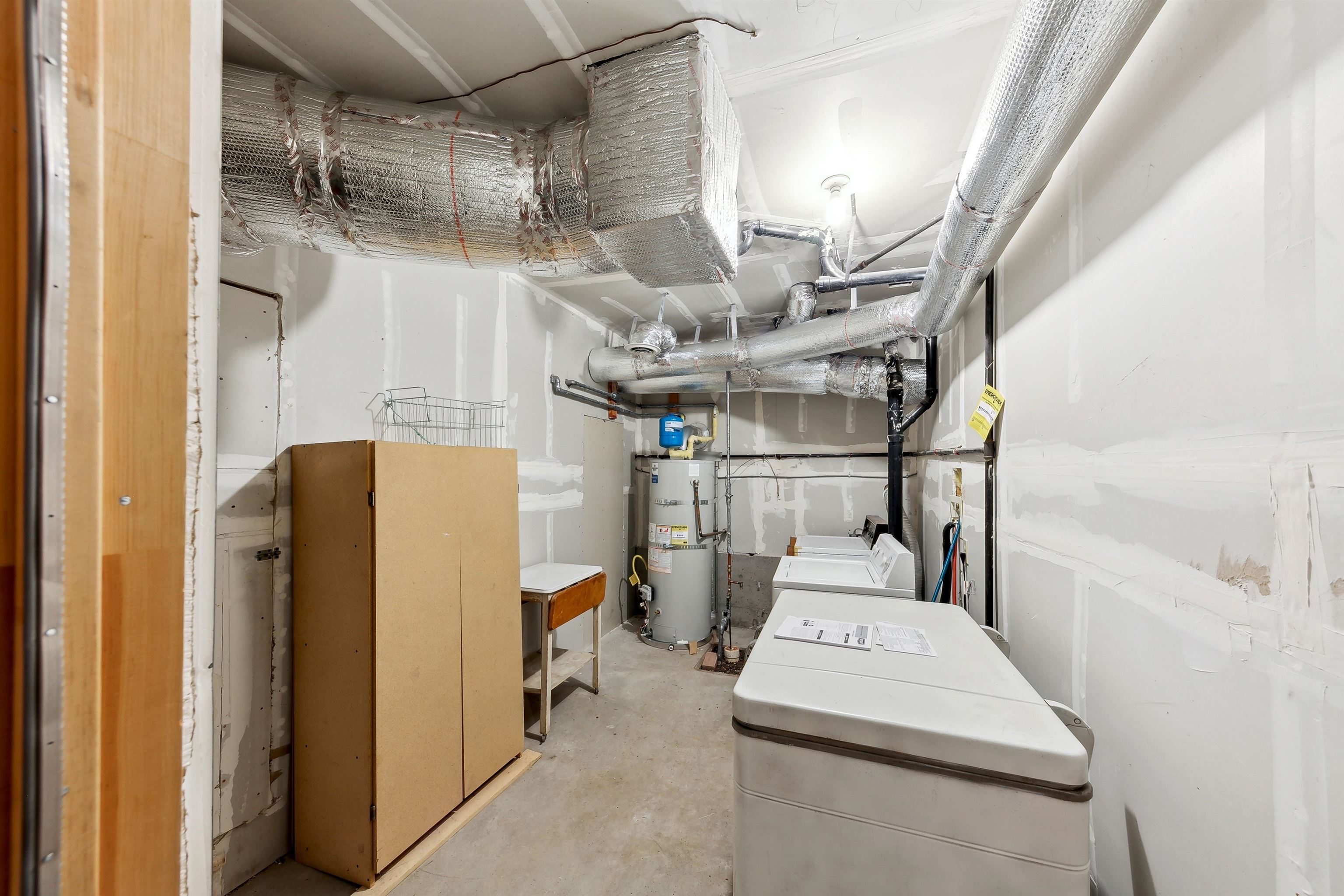 12354 Rainbow Drive Truckee, CA 96161 - Photo 18 of 23 a utility room with dryer and washer