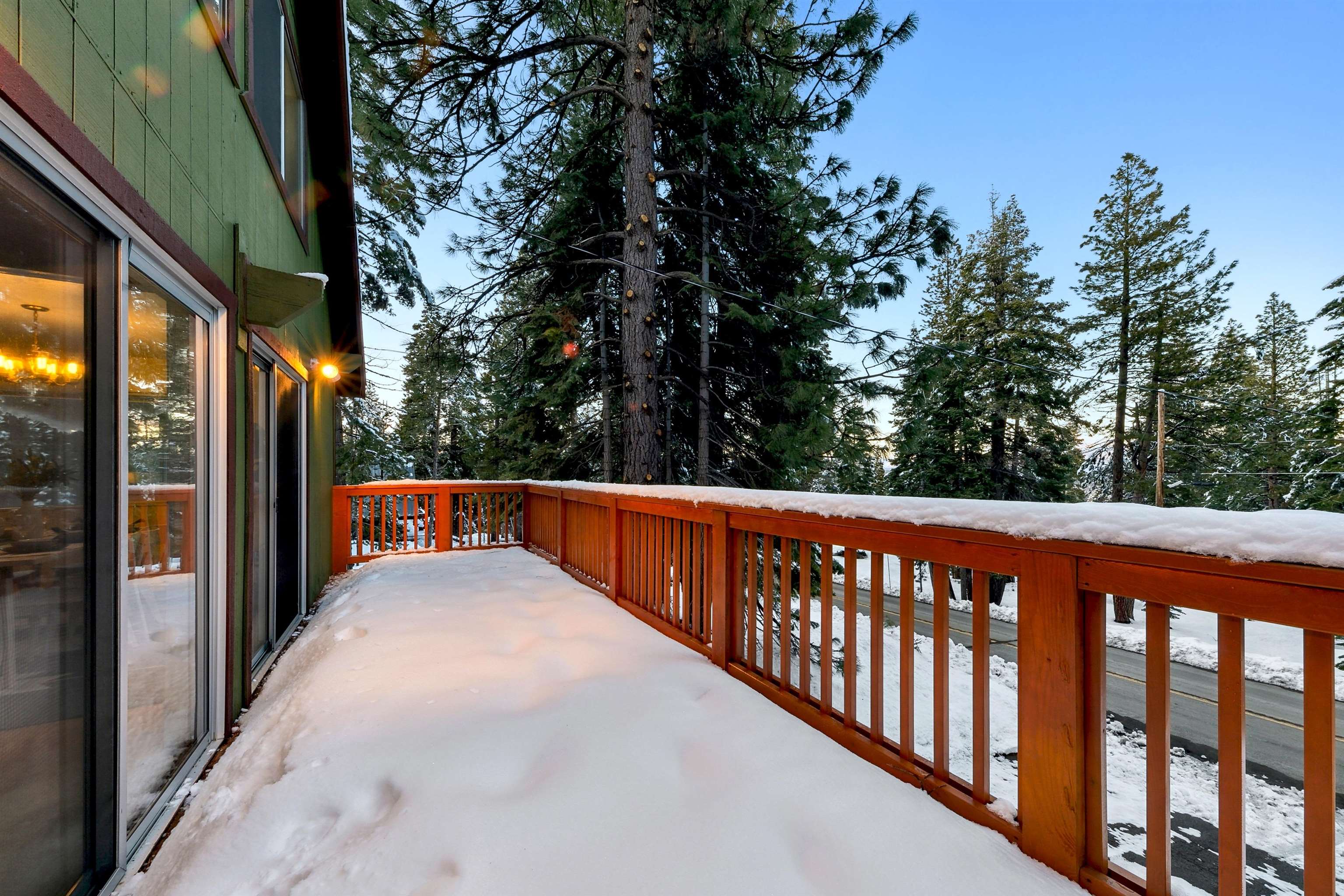 12354 Rainbow Drive Truckee, CA 96161 - Photo 20 of 23 a balcony with tall trees in front of it
