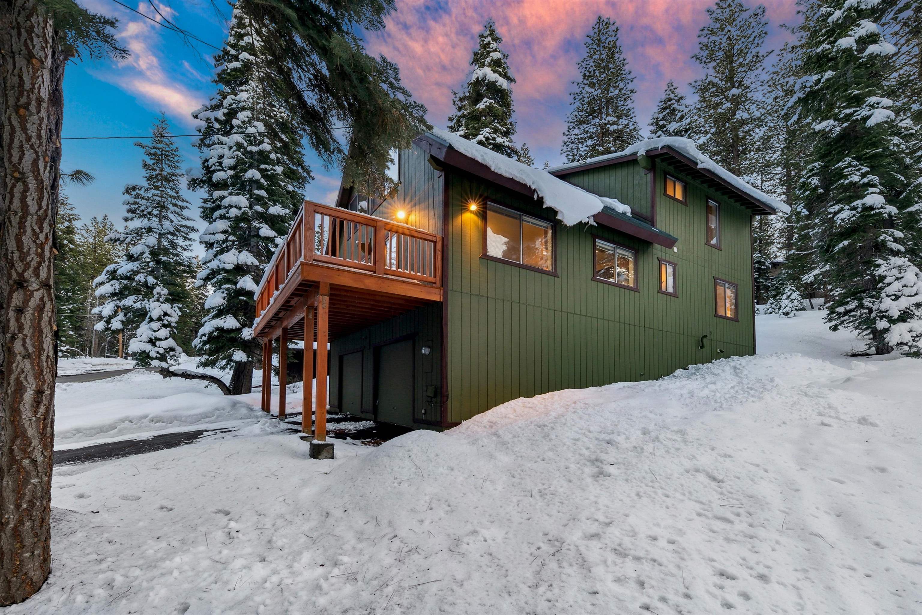 12354 Rainbow Drive Truckee, CA 96161 - Photo 21 of 23 a view of a house with a yard and garage