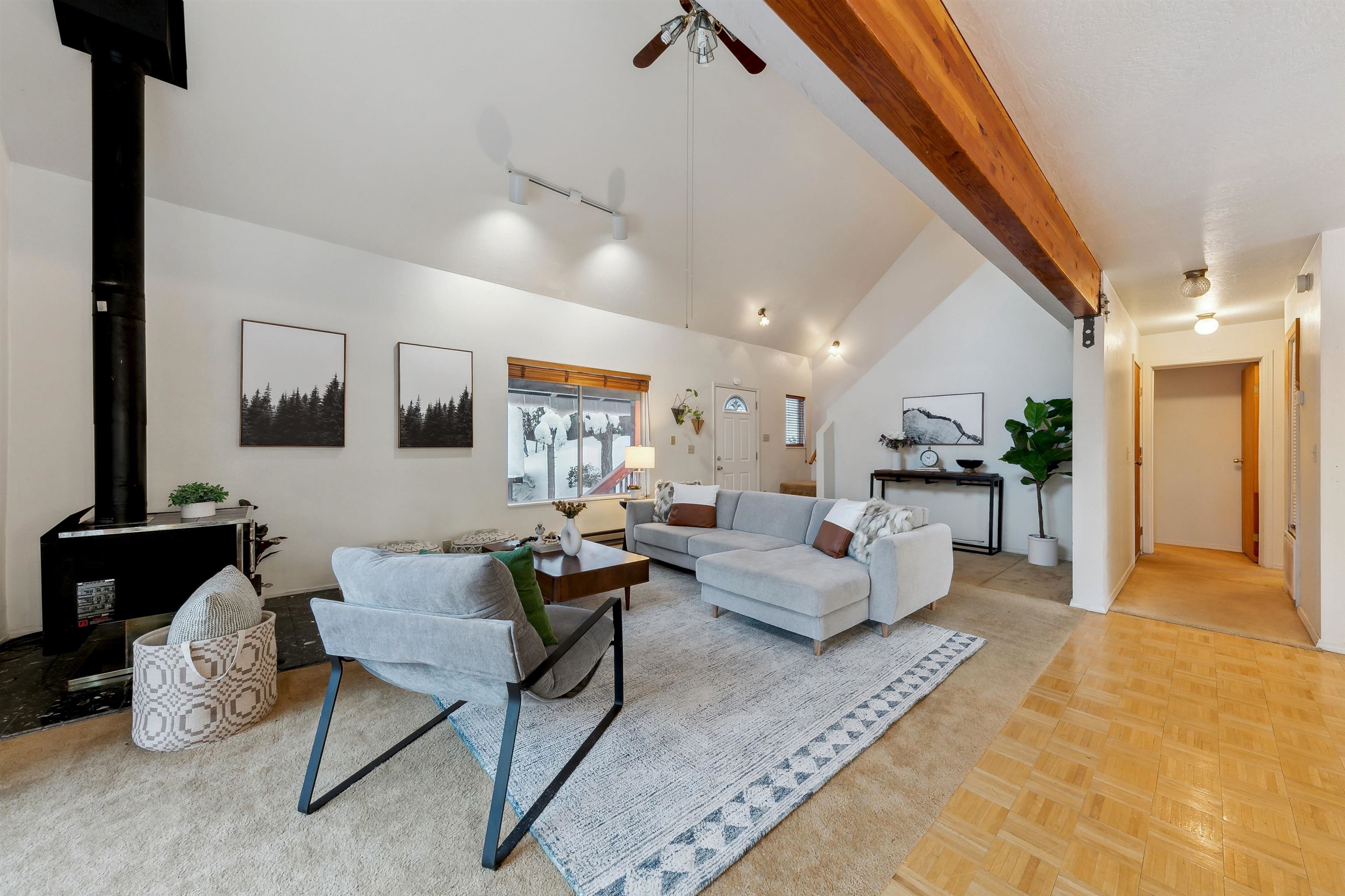 12354 Rainbow Drive Truckee, CA 96161 - Photo 4 of 23 a living room with furniture and a wooden floor