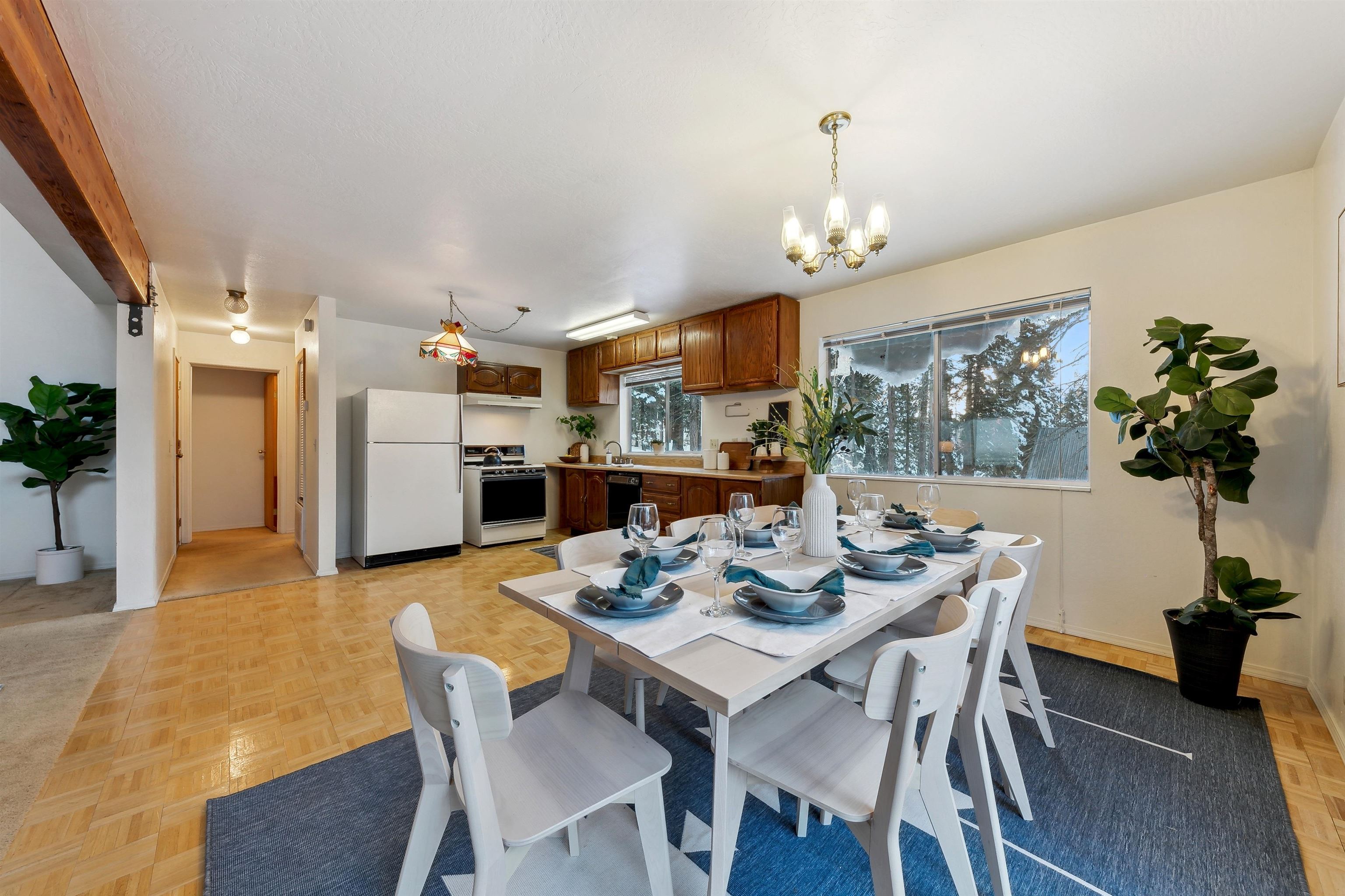 12354 Rainbow Drive Truckee, CA 96161 - Photo 7 of 23 a view of a dining room with furniture window and wooden floor