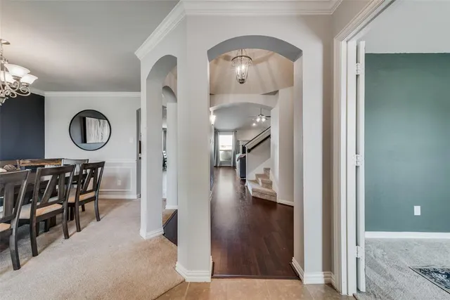 a view of a livingroom with furniture and wooden floor