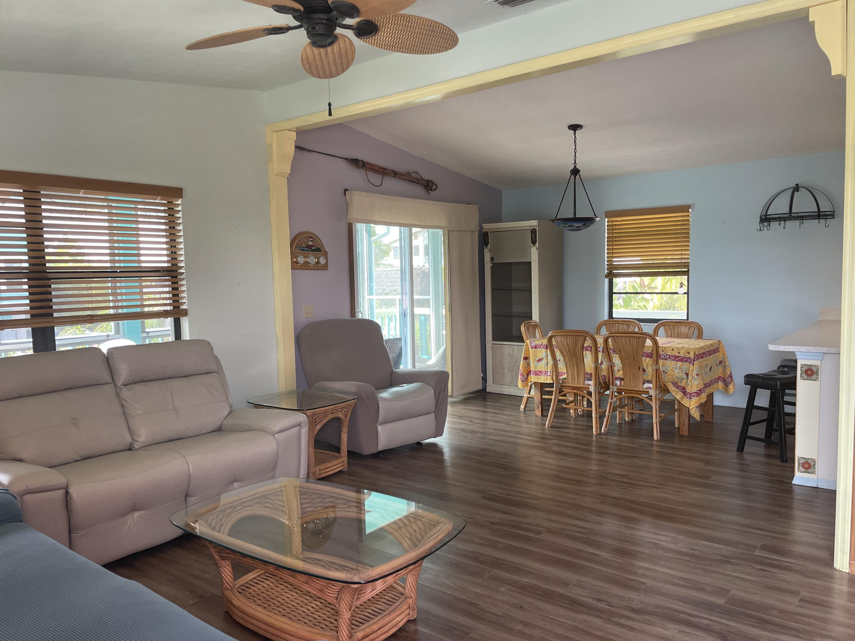 744 Blackbeard Road Summerland Key, FL 33042 - Photo 7 of 39 a living room with furniture and a window