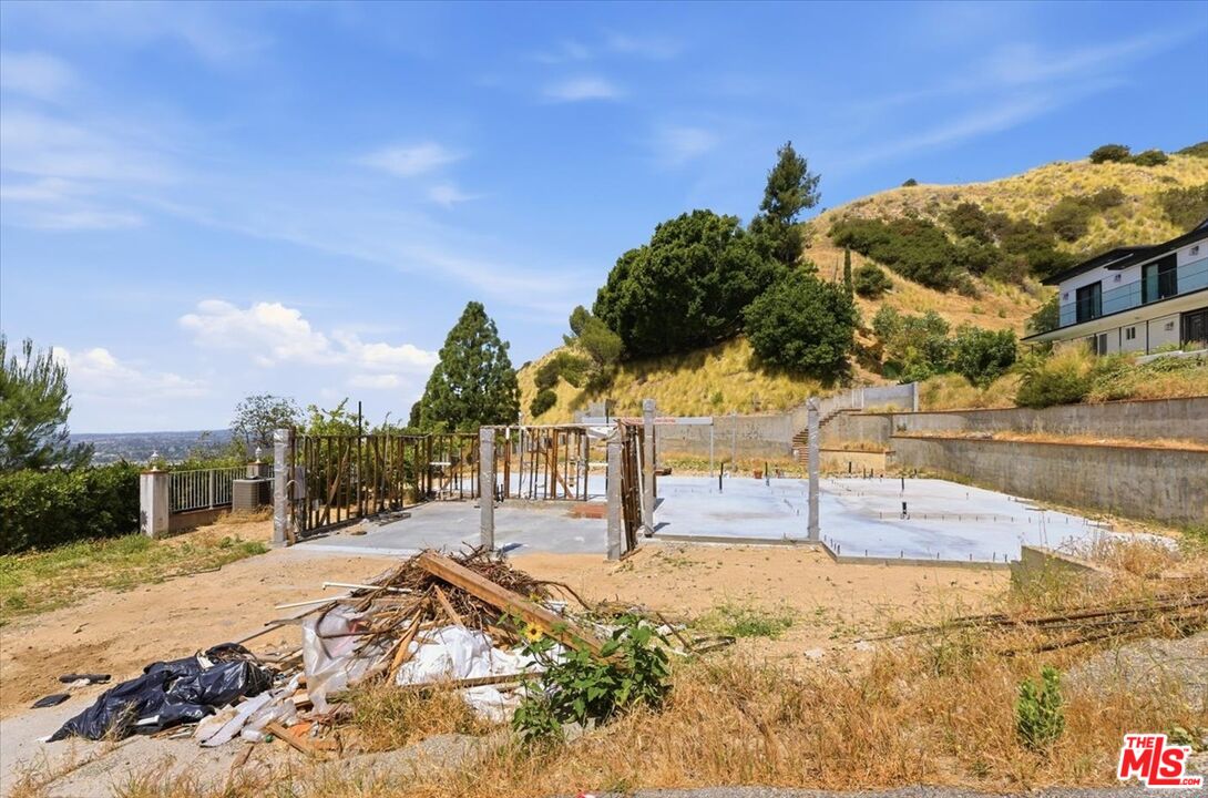 9865 Lanark Street Sun Valley, CA 91352 - Photo 13 of 13 a view of a swimming pool with an outdoor seating