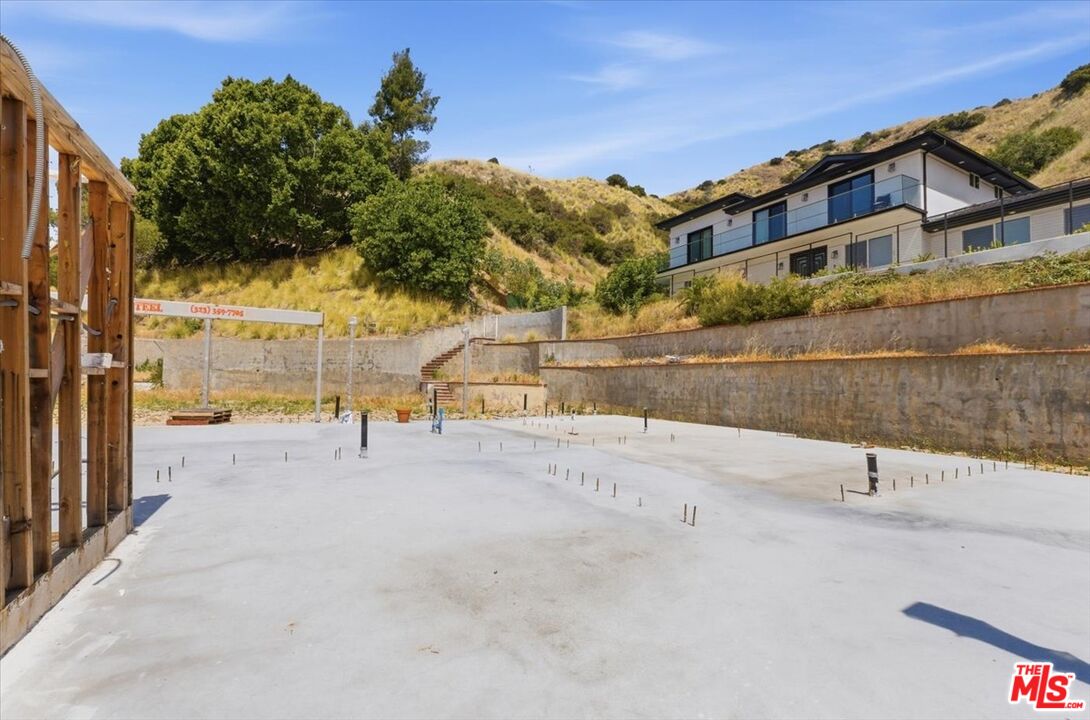 9865 Lanark Street Sun Valley, CA 91352 - Photo 3 of 13 a view of a street with a building in the background